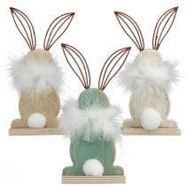 Prodotto Coniglietti decorativi in legno con piume Decorazione pasquale H17,5 cm 3 pezzi