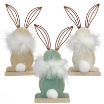 Prodotto Coniglietti decorativi in legno con piume Decorazione pasquale H17,5 cm 3 pz