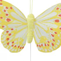 Prodotto Farfalle decorative su filo di piume giallo arancio 7×11 cm 12 pz
