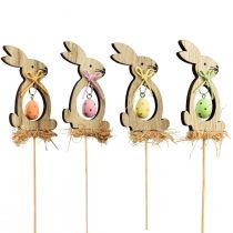 Prodotto Spina fiore Spina decorativa in legno coniglio con uovo 5x8,5 cm 12 pz