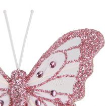 Prodotto Farfalle decorative realizzate in piume glitter rosa 7,5x7 cm 4 pz
