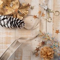 Prodotto Nastro regalo sottile beige, ideale per confezioni regalo, largo 10 mm e lungo 50 m.