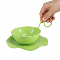Prodotto Tazza decorativa in metallo con piattino, verde chiaro, H8cm Ø11.5cm, 2 pezzi