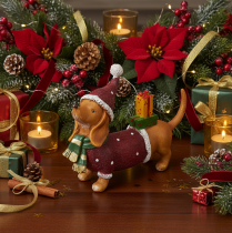 Prodotto Statuetta decorativa di bassotto con confezione regalo e cappellino, 18 cm
