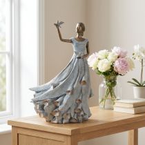 Prodotto Statuetta di donna con uccello Scultura decorativa dal design raffinato e senza tempo 41 cm