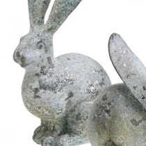 Prodotto Coniglietto decorativo, figura da giardino in effetto cemento, shabby chic, decorazione pasquale con accenti argentati H21/14 cm, set da 2