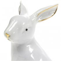 Prodotto Decorazione pasquale in ceramica a forma di coniglietto, in oro bianco, altezza 7,5 cm, 4 pezzi