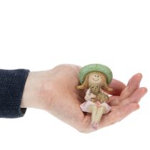 Prodotto Statuetta da scaffale raffigurante una ragazza sorridente con un cane, Ø4,5 cm, H9,5 cm.