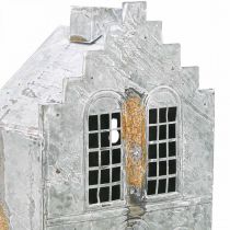 Prodotto Portacandele in metallo, a forma di casetta, alto 25,5 cm.