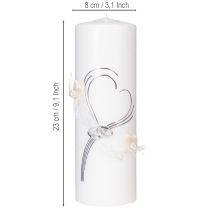 Prodotto Candela nuziale festiva con un elegante design a cuore, decorazioni argentate e nastro in organza – ideale per matrimoni e anniversari di nozze d'argento, 230/80 mm