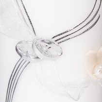 Prodotto Candela nuziale festiva con un elegante design a cuore, decorazioni argentate e nastro in organza – ideale per matrimoni e anniversari di nozze d'argento, 230/80 mm
