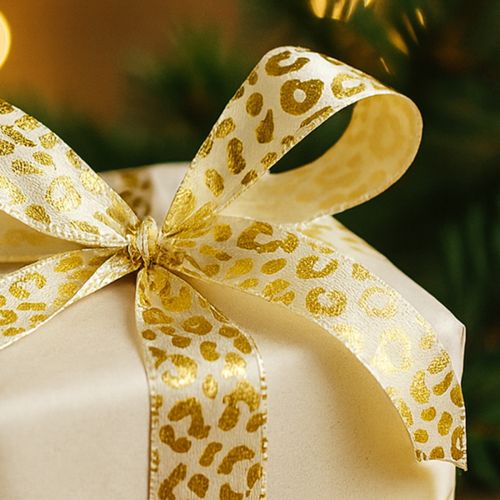 Prodotto Nastro di seta con stampa leopardata, crema e oro, 15 mm, 18 m