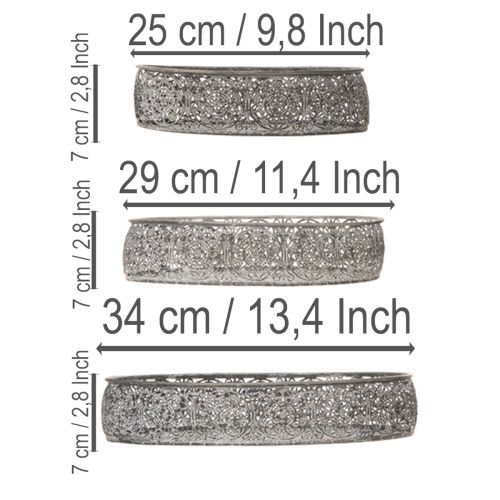 Prodotto Set di 3 ciotole decorative ovali in metallo, colore grigio, dimensioni 25,5/29/34,5 cm.
