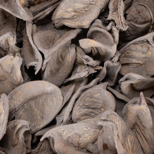 Prodotto Decorazione da tavola con potpourri e noci per un'atmosfera estiva naturale.