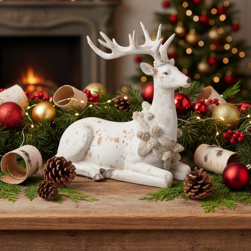 Statuetta decorativa di un cervo seduto con le corna, 30 cm | Floristik24.it