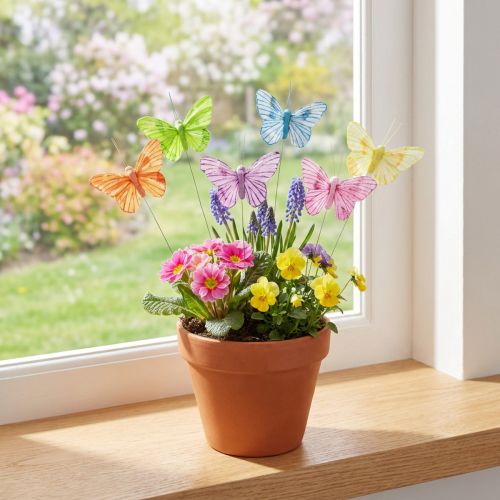 Prodotto Farfalle decorative su filo piume colorate 5,5×8 cm 12 pz