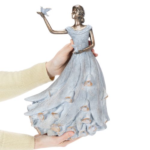 Prodotto Statuetta raffigurante una donna con un uccello. Scultura decorativa dal design raffinato e senza tempo. 41 cm