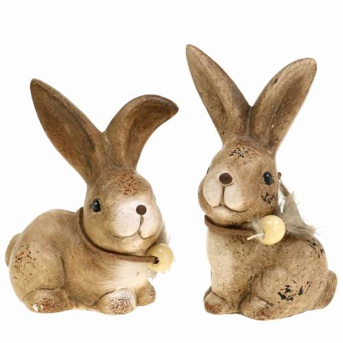 Prodotto Figure decorative conigli con piuma e legno marrone perla assortiti 7 cm x 4,9 cm H 10 cm 2 pezzi