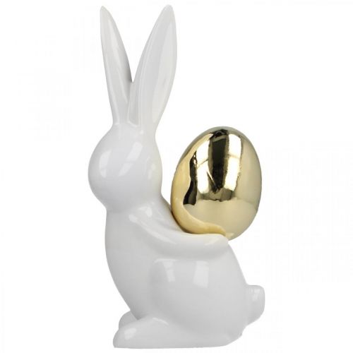 Floristik24 Coniglietti pasquali eleganti, coniglietti in ceramica con uovo d&#39;oro, decorazione pasquale bianca, dorata H18cm 2 pezzi