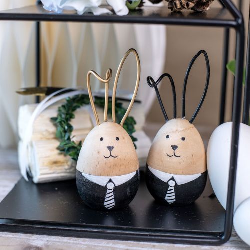 Prodotto Conigli pasquali uova di conigli in legno Decorazione pasquale nero bianco Ø4,5 cm 12 cm 4 pezzi
