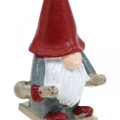 Floristik24 Candela con motivo elfo natalizio, decorazione dell&#39;avvento, elfo con gli sci, candela decorativa H12cm