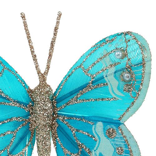 Prodotto Farfalle decorative turchesi con glitter 7cm 4 pezzi