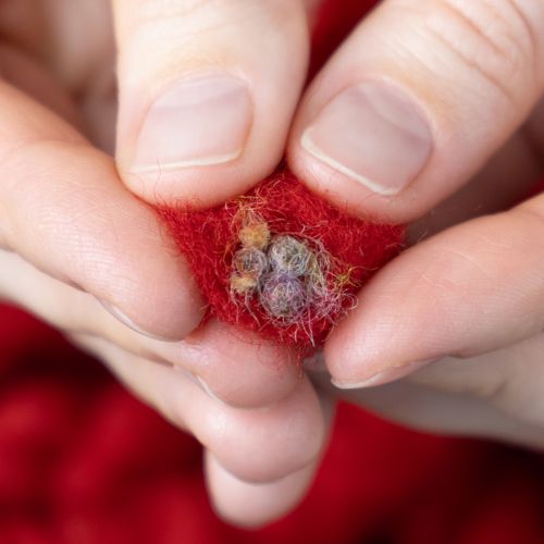 Prodotto Cordoncino di lana soffice Mirabell con iuta, rosso, 25 m