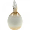 Floristik24 Coniglietto pasquale uovo bianco in ceramica figura decorativa coniglio Ø6cm H11.5cm